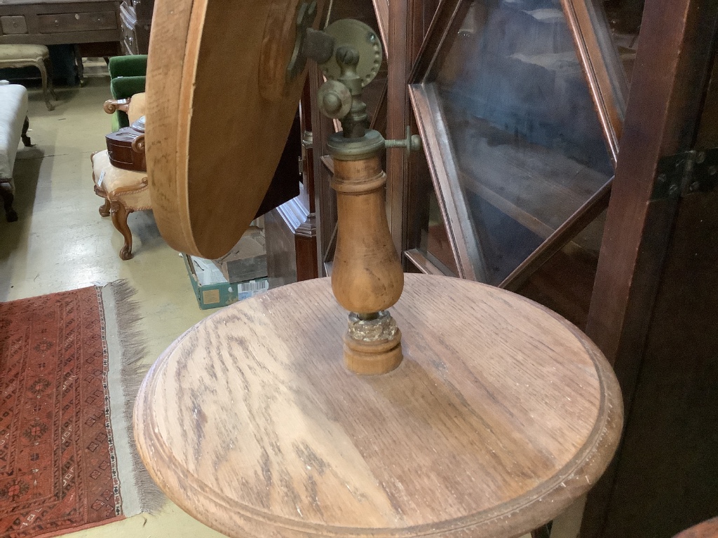 An Edwardian oak shaving stand, with telescopic plate, height approx. 133cm